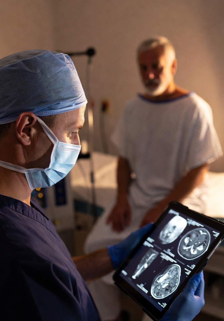 Surgeon discussing cervical spine treatment with a patient